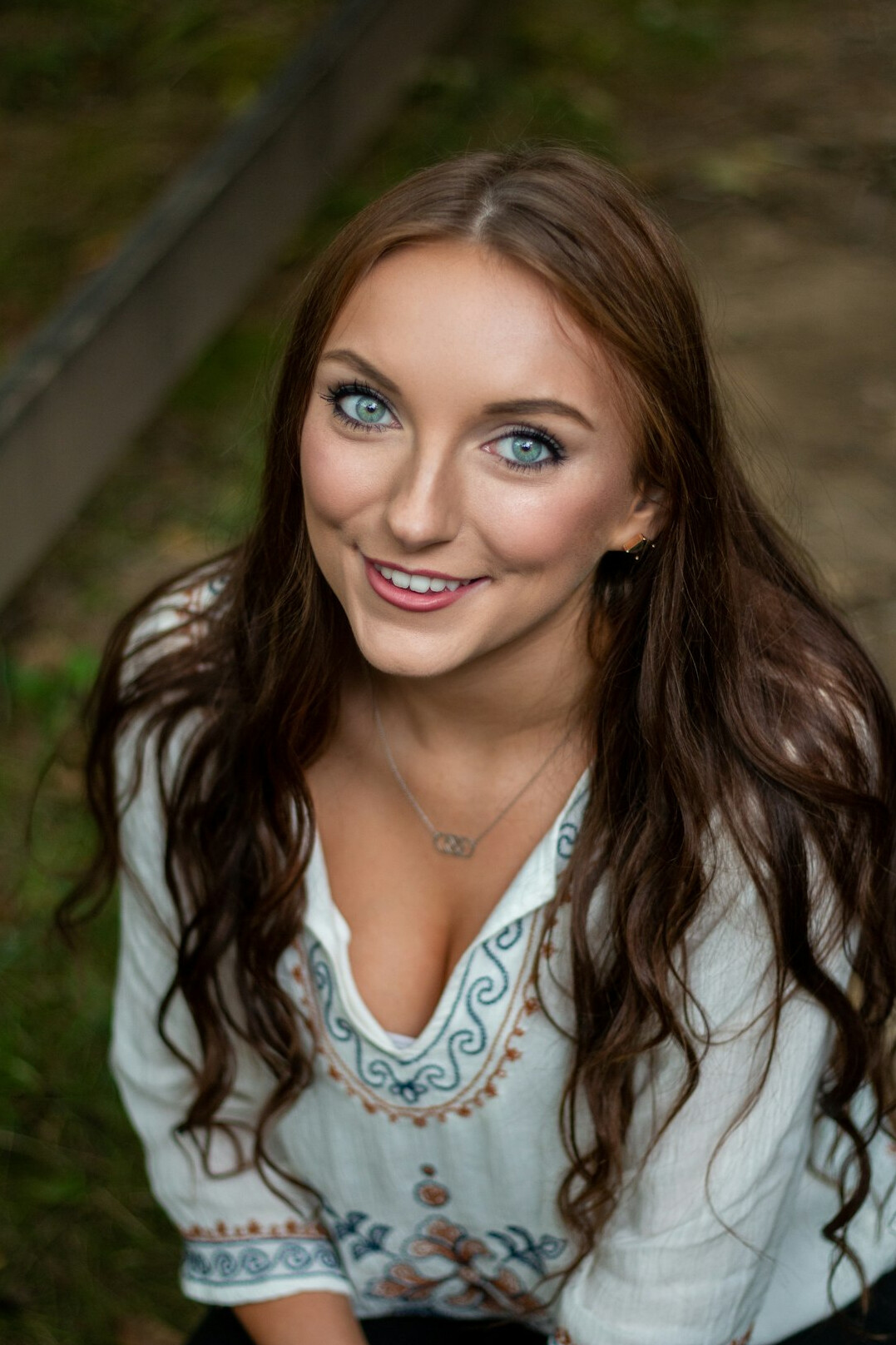 Portrait of a young smiling woman with long hair